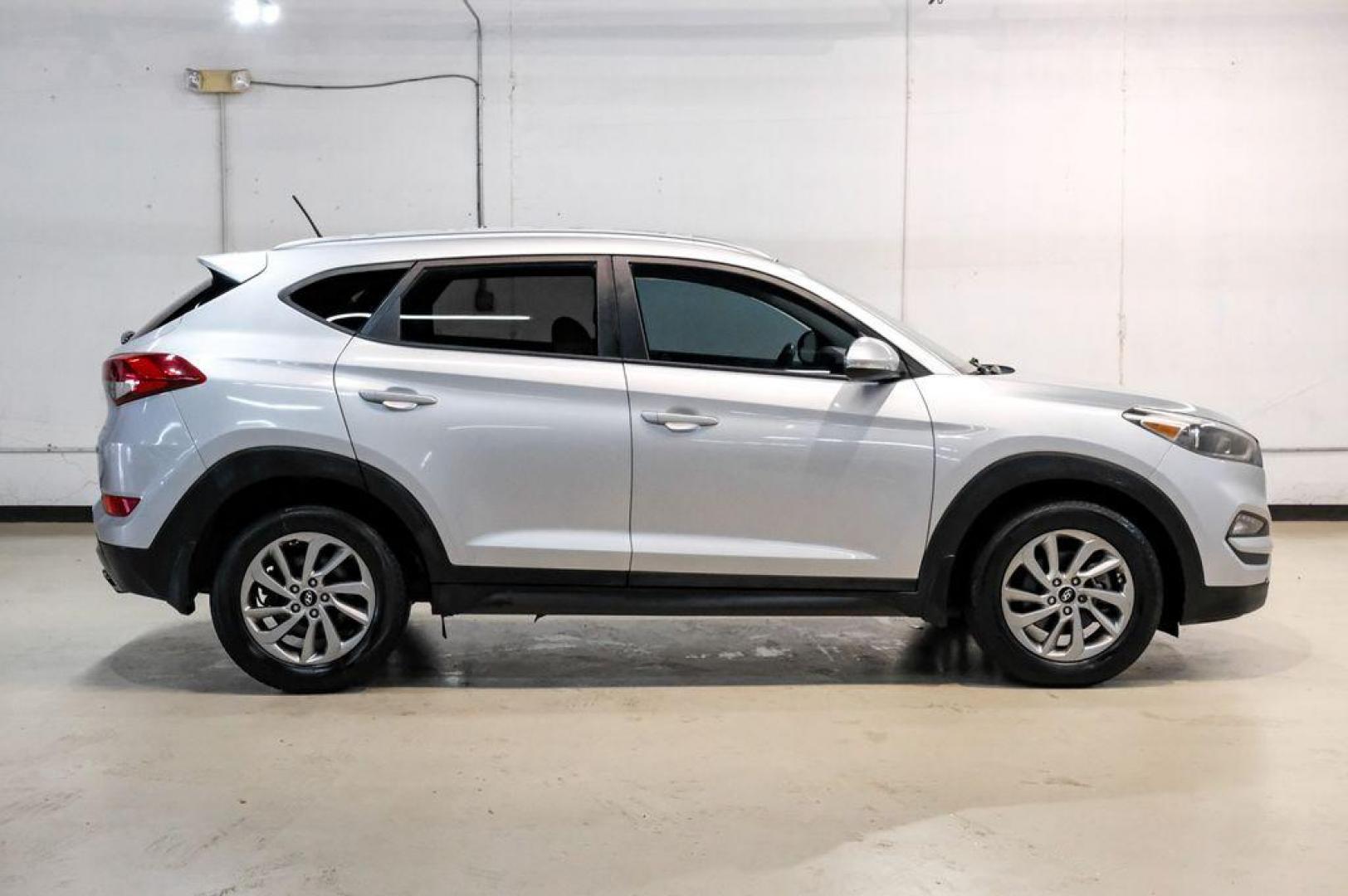 2016 Molten Silver /Gray Hyundai Tucson Eco (KM8J33A28GU) with an 1.6L I4 DGI Turbocharged DOHC 16V ULEV II 175hp engine, Automatic transmission, located at 15300 Midway Rd., Addison, TX, 75001, (972) 702-0011, 32.958321, -96.838074 - Photo#8