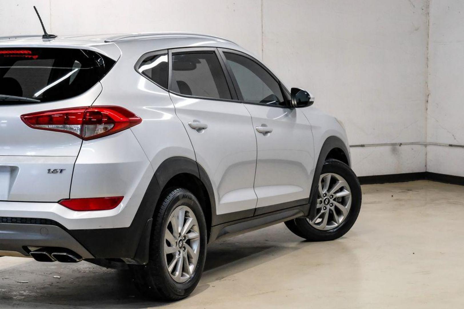 2016 Molten Silver /Gray Hyundai Tucson Eco (KM8J33A28GU) with an 1.6L I4 DGI Turbocharged DOHC 16V ULEV II 175hp engine, Automatic transmission, located at 15300 Midway Rd., Addison, TX, 75001, (972) 702-0011, 32.958321, -96.838074 - Photo#11