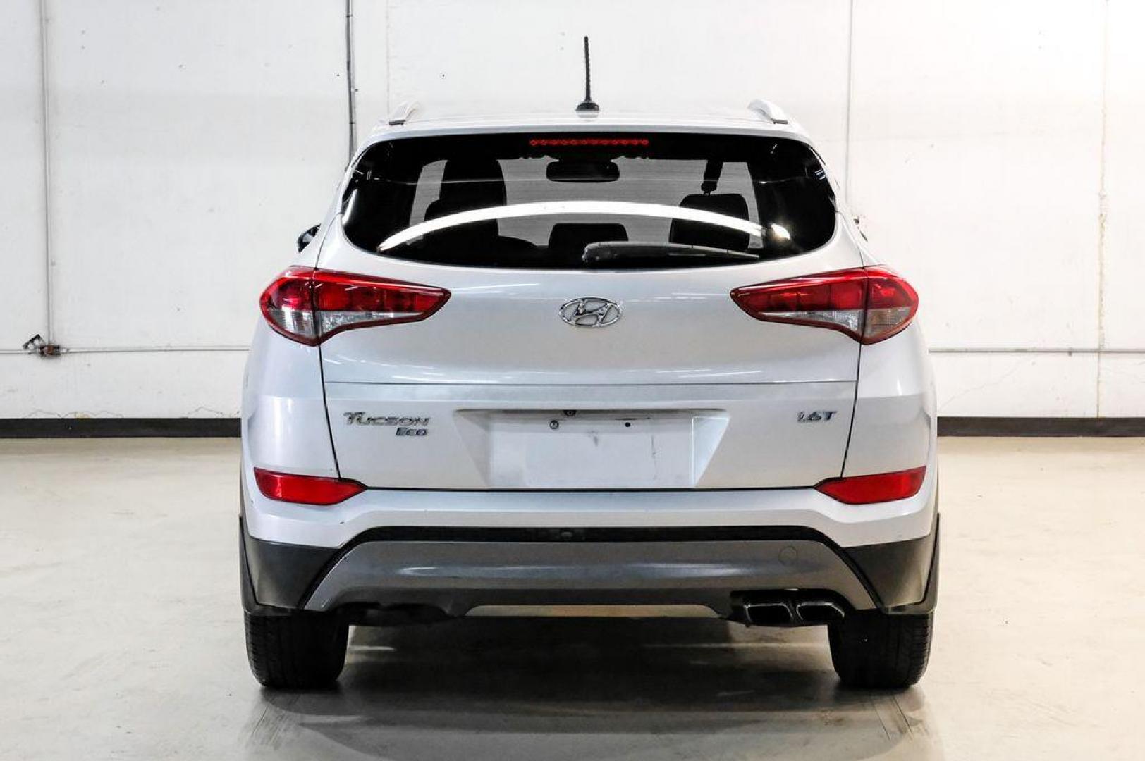 2016 Molten Silver /Gray Hyundai Tucson Eco (KM8J33A28GU) with an 1.6L I4 DGI Turbocharged DOHC 16V ULEV II 175hp engine, Automatic transmission, located at 15300 Midway Rd., Addison, TX, 75001, (972) 702-0011, 32.958321, -96.838074 - Photo#12