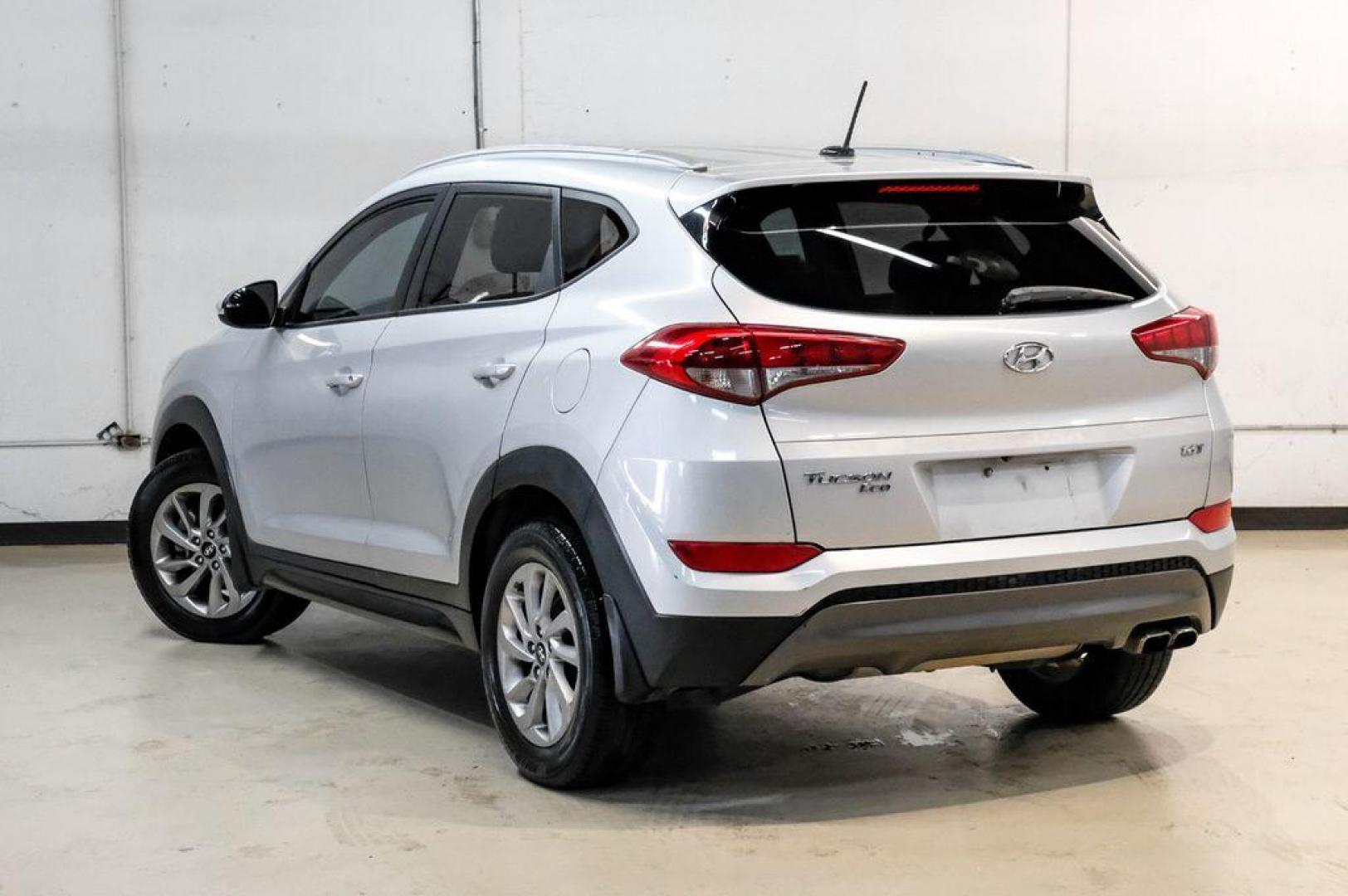 2016 Molten Silver /Gray Hyundai Tucson Eco (KM8J33A28GU) with an 1.6L I4 DGI Turbocharged DOHC 16V ULEV II 175hp engine, Automatic transmission, located at 15300 Midway Rd., Addison, TX, 75001, (972) 702-0011, 32.958321, -96.838074 - Photo#13