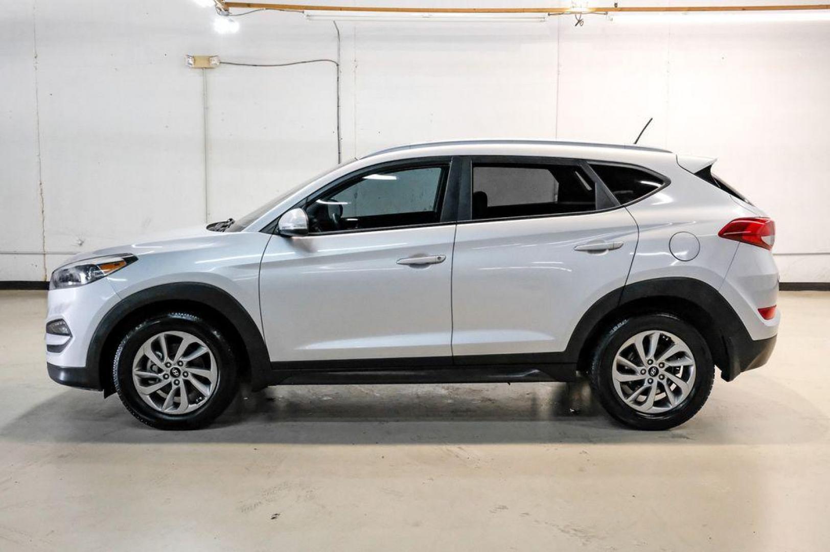2016 Molten Silver /Gray Hyundai Tucson Eco (KM8J33A28GU) with an 1.6L I4 DGI Turbocharged DOHC 16V ULEV II 175hp engine, Automatic transmission, located at 15300 Midway Rd., Addison, TX, 75001, (972) 702-0011, 32.958321, -96.838074 - Photo#14