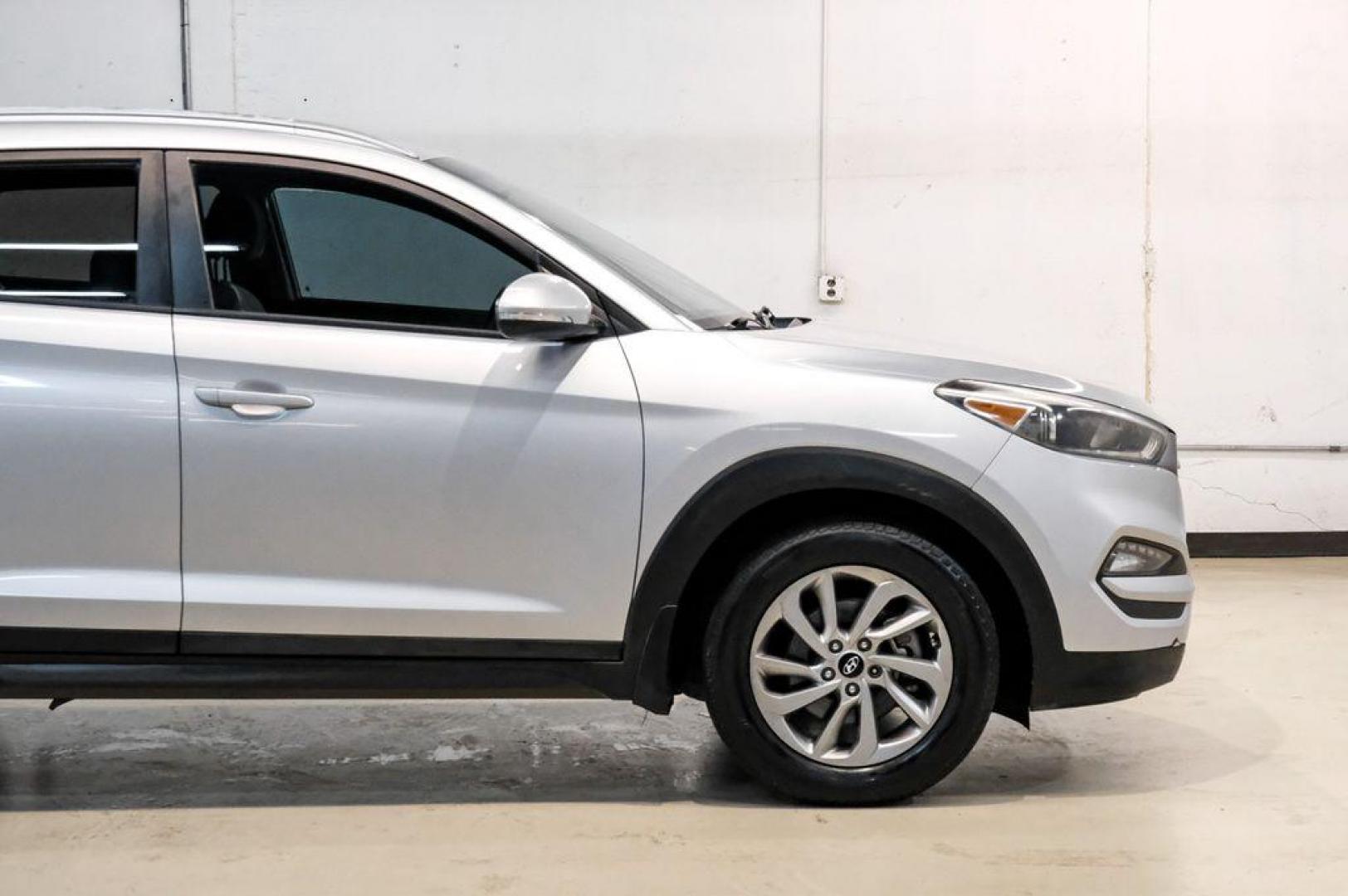 2016 Molten Silver /Gray Hyundai Tucson Eco (KM8J33A28GU) with an 1.6L I4 DGI Turbocharged DOHC 16V ULEV II 175hp engine, Automatic transmission, located at 15300 Midway Rd., Addison, TX, 75001, (972) 702-0011, 32.958321, -96.838074 - Photo#16