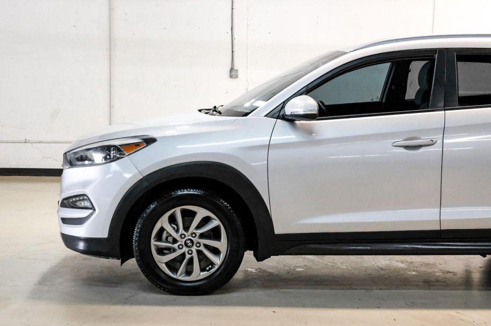 2016 Molten Silver /Gray Hyundai Tucson Eco (KM8J33A28GU) with an 1.6L I4 DGI Turbocharged DOHC 16V ULEV II 175hp engine, Automatic transmission, located at 15300 Midway Rd., Addison, TX, 75001, (972) 702-0011, 32.958321, -96.838074 - Photo#17