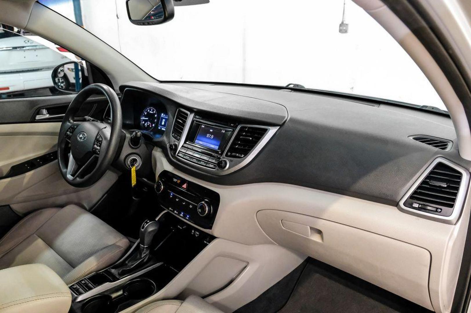 2016 Molten Silver /Gray Hyundai Tucson Eco (KM8J33A28GU) with an 1.6L I4 DGI Turbocharged DOHC 16V ULEV II 175hp engine, Automatic transmission, located at 15300 Midway Rd., Addison, TX, 75001, (972) 702-0011, 32.958321, -96.838074 - Photo#19