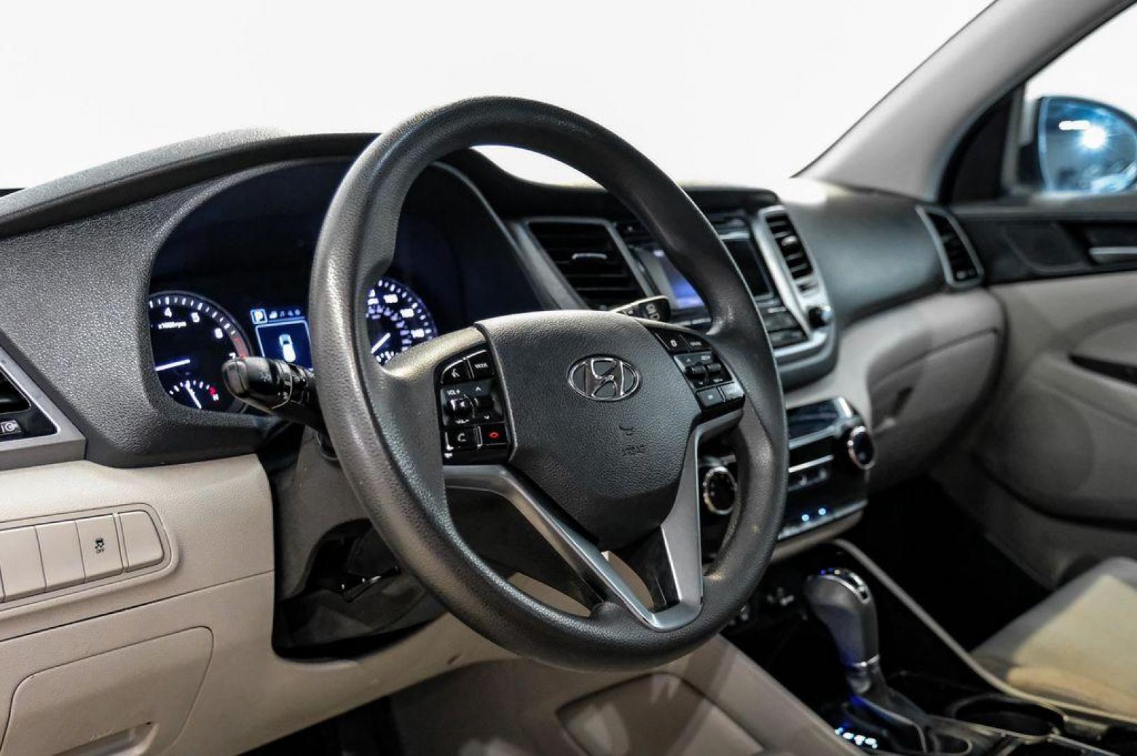 2016 Molten Silver /Gray Hyundai Tucson Eco (KM8J33A28GU) with an 1.6L I4 DGI Turbocharged DOHC 16V ULEV II 175hp engine, Automatic transmission, located at 15300 Midway Rd., Addison, TX, 75001, (972) 702-0011, 32.958321, -96.838074 - Photo#22