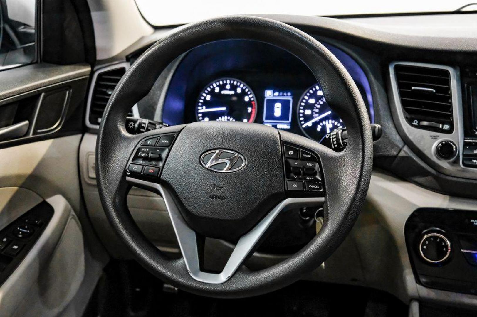 2016 Molten Silver /Gray Hyundai Tucson Eco (KM8J33A28GU) with an 1.6L I4 DGI Turbocharged DOHC 16V ULEV II 175hp engine, Automatic transmission, located at 15300 Midway Rd., Addison, TX, 75001, (972) 702-0011, 32.958321, -96.838074 - Photo#23