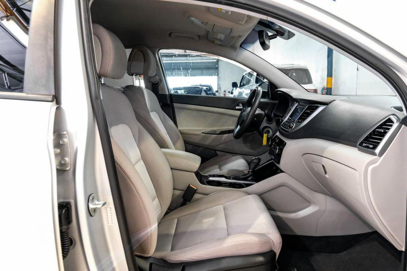 2016 Molten Silver /Gray Hyundai Tucson Eco (KM8J33A28GU) with an 1.6L I4 DGI Turbocharged DOHC 16V ULEV II 175hp engine, Automatic transmission, located at 15300 Midway Rd., Addison, TX, 75001, (972) 702-0011, 32.958321, -96.838074 - Photo#46