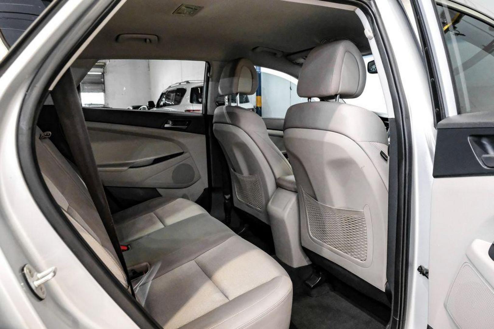 2016 Molten Silver /Gray Hyundai Tucson Eco (KM8J33A28GU) with an 1.6L I4 DGI Turbocharged DOHC 16V ULEV II 175hp engine, Automatic transmission, located at 15300 Midway Rd., Addison, TX, 75001, (972) 702-0011, 32.958321, -96.838074 - Photo#49