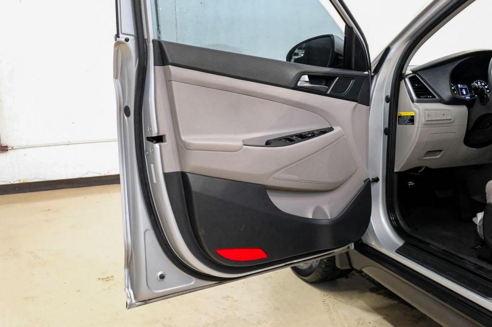 2016 Molten Silver /Gray Hyundai Tucson Eco (KM8J33A28GU) with an 1.6L I4 DGI Turbocharged DOHC 16V ULEV II 175hp engine, Automatic transmission, located at 15300 Midway Rd., Addison, TX, 75001, (972) 702-0011, 32.958321, -96.838074 - Photo#54