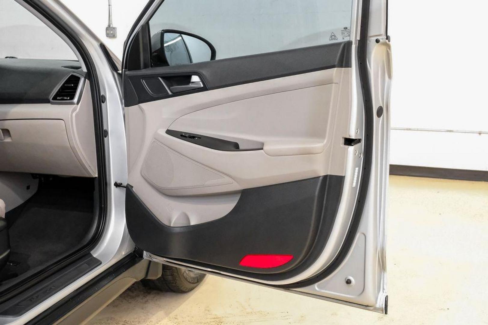 2016 Molten Silver /Gray Hyundai Tucson Eco (KM8J33A28GU) with an 1.6L I4 DGI Turbocharged DOHC 16V ULEV II 175hp engine, Automatic transmission, located at 15300 Midway Rd., Addison, TX, 75001, (972) 702-0011, 32.958321, -96.838074 - Photo#56