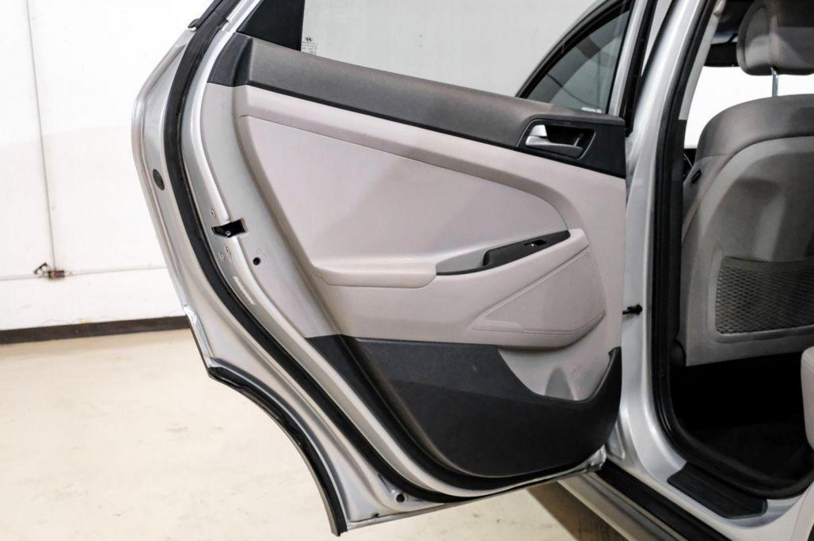 2016 Molten Silver /Gray Hyundai Tucson Eco (KM8J33A28GU) with an 1.6L I4 DGI Turbocharged DOHC 16V ULEV II 175hp engine, Automatic transmission, located at 15300 Midway Rd., Addison, TX, 75001, (972) 702-0011, 32.958321, -96.838074 - Photo#57