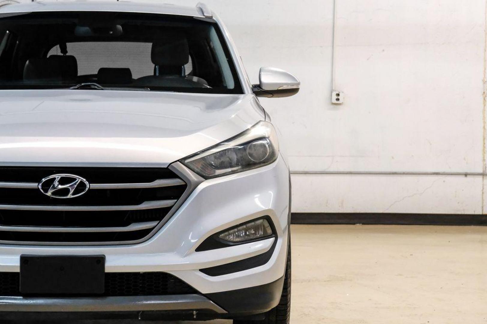 2016 Molten Silver /Gray Hyundai Tucson Eco (KM8J33A28GU) with an 1.6L I4 DGI Turbocharged DOHC 16V ULEV II 175hp engine, Automatic transmission, located at 15300 Midway Rd., Addison, TX, 75001, (972) 702-0011, 32.958321, -96.838074 - Photo#59