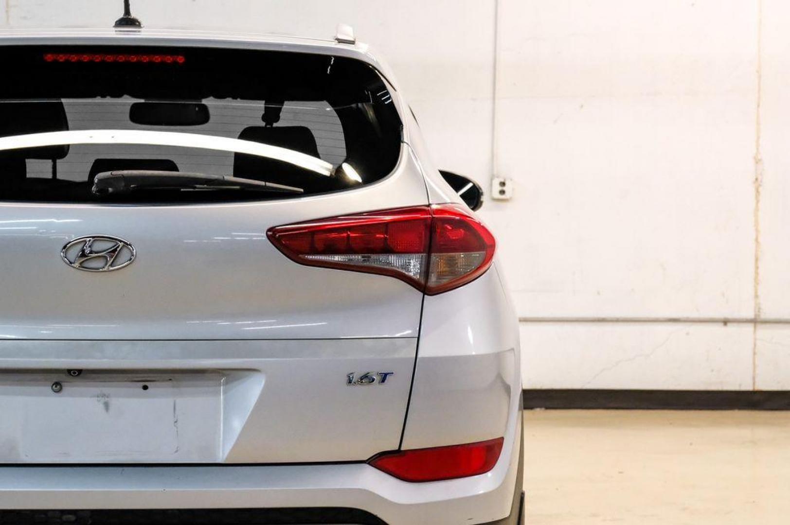 2016 Molten Silver /Gray Hyundai Tucson Eco (KM8J33A28GU) with an 1.6L I4 DGI Turbocharged DOHC 16V ULEV II 175hp engine, Automatic transmission, located at 15300 Midway Rd., Addison, TX, 75001, (972) 702-0011, 32.958321, -96.838074 - Photo#60