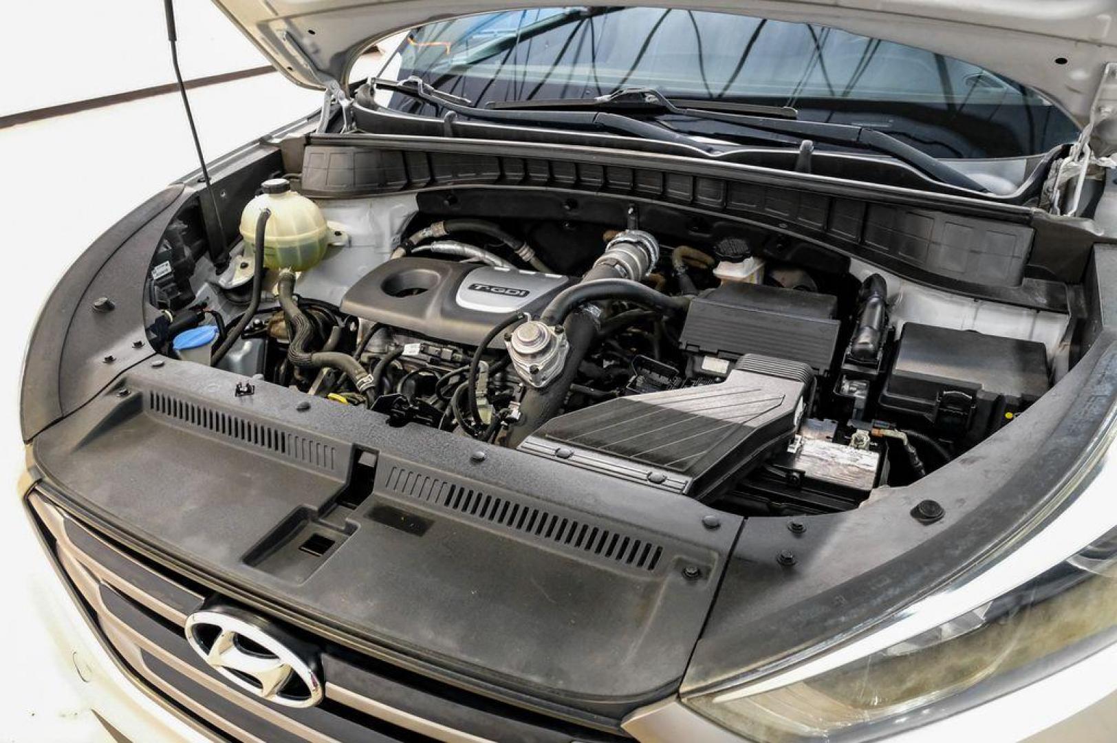 2016 Molten Silver /Gray Hyundai Tucson Eco (KM8J33A28GU) with an 1.6L I4 DGI Turbocharged DOHC 16V ULEV II 175hp engine, Automatic transmission, located at 15300 Midway Rd., Addison, TX, 75001, (972) 702-0011, 32.958321, -96.838074 - Photo#61