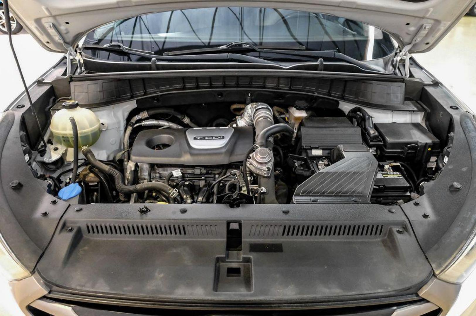 2016 Molten Silver /Gray Hyundai Tucson Eco (KM8J33A28GU) with an 1.6L I4 DGI Turbocharged DOHC 16V ULEV II 175hp engine, Automatic transmission, located at 15300 Midway Rd., Addison, TX, 75001, (972) 702-0011, 32.958321, -96.838074 - Photo#62