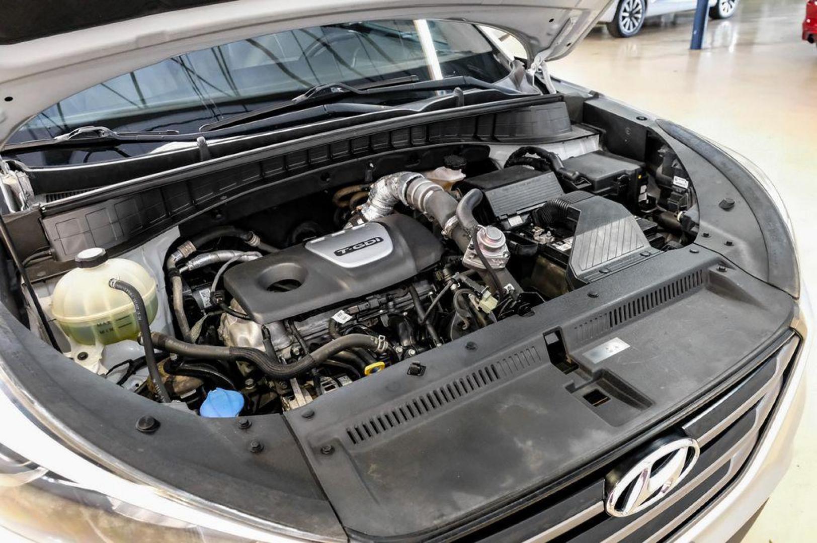 2016 Molten Silver /Gray Hyundai Tucson Eco (KM8J33A28GU) with an 1.6L I4 DGI Turbocharged DOHC 16V ULEV II 175hp engine, Automatic transmission, located at 15300 Midway Rd., Addison, TX, 75001, (972) 702-0011, 32.958321, -96.838074 - Photo#63