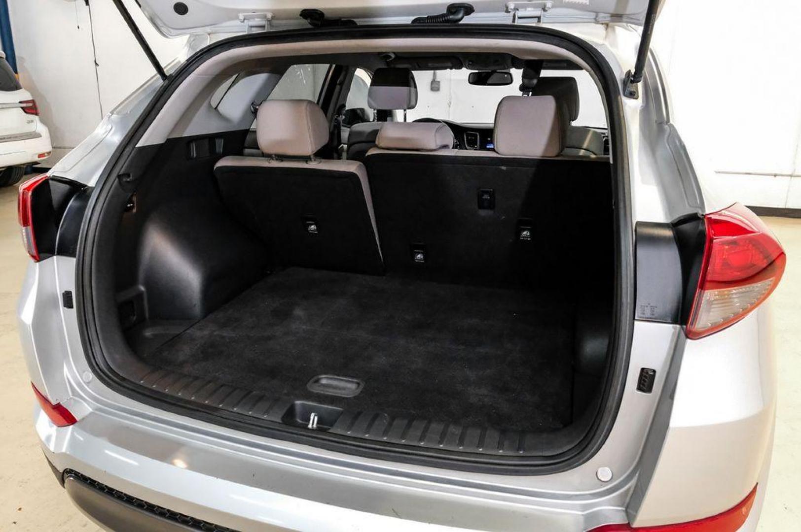 2016 Molten Silver /Gray Hyundai Tucson Eco (KM8J33A28GU) with an 1.6L I4 DGI Turbocharged DOHC 16V ULEV II 175hp engine, Automatic transmission, located at 15300 Midway Rd., Addison, TX, 75001, (972) 702-0011, 32.958321, -96.838074 - Photo#64