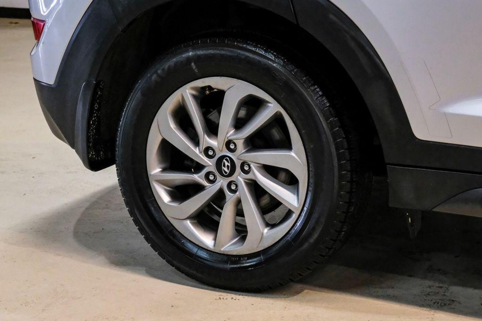 2016 Molten Silver /Gray Hyundai Tucson Eco (KM8J33A28GU) with an 1.6L I4 DGI Turbocharged DOHC 16V ULEV II 175hp engine, Automatic transmission, located at 15300 Midway Rd., Addison, TX, 75001, (972) 702-0011, 32.958321, -96.838074 - Photo#66