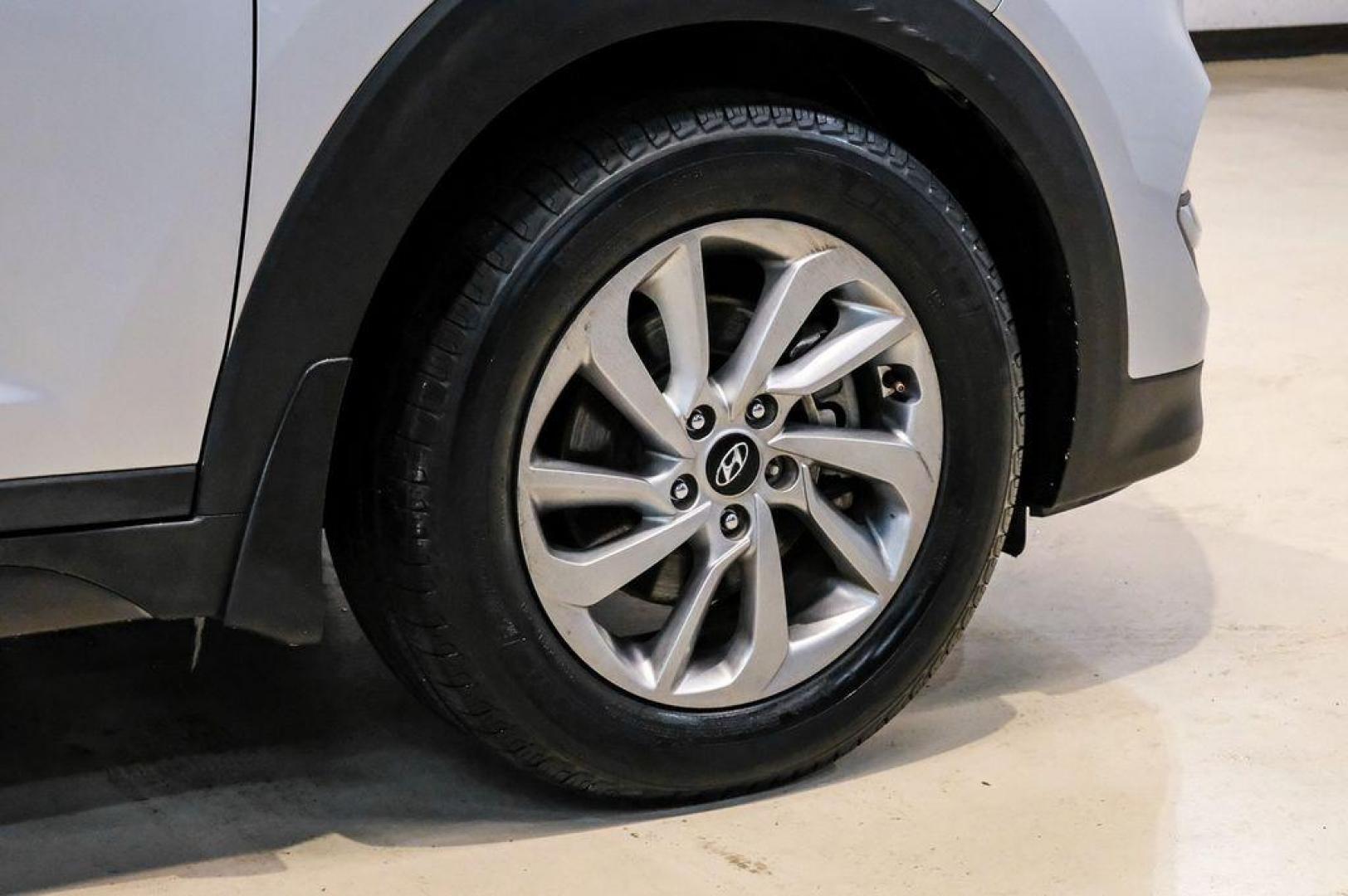 2016 Molten Silver /Gray Hyundai Tucson Eco (KM8J33A28GU) with an 1.6L I4 DGI Turbocharged DOHC 16V ULEV II 175hp engine, Automatic transmission, located at 15300 Midway Rd., Addison, TX, 75001, (972) 702-0011, 32.958321, -96.838074 - Photo#67