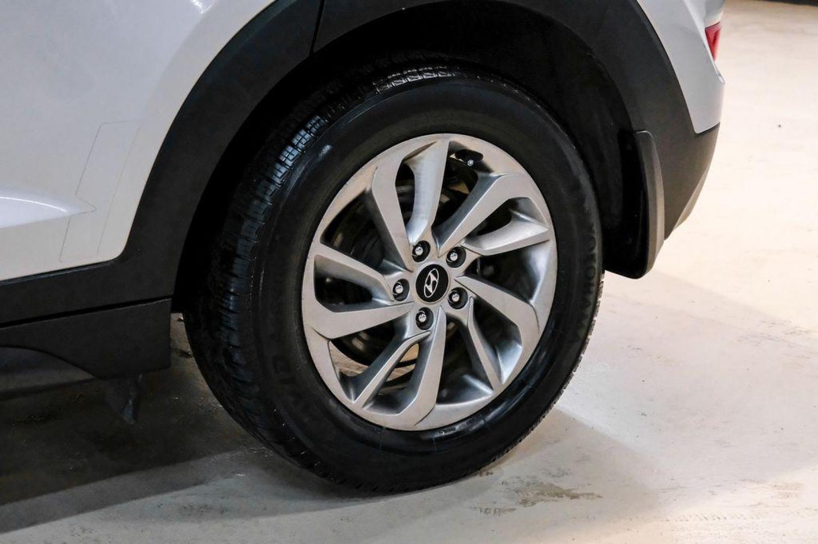 2016 Molten Silver /Gray Hyundai Tucson Eco (KM8J33A28GU) with an 1.6L I4 DGI Turbocharged DOHC 16V ULEV II 175hp engine, Automatic transmission, located at 15300 Midway Rd., Addison, TX, 75001, (972) 702-0011, 32.958321, -96.838074 - Photo#69