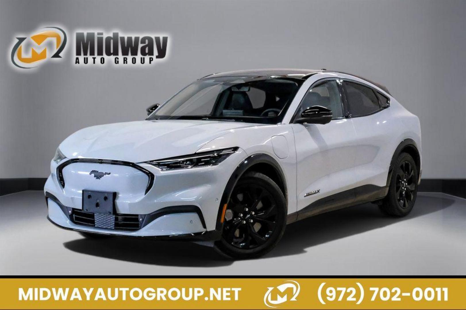 2023 White Metallic /Black Onyx Ford Mustang Mach-E Premium (3FMTK3R71PM) with an Electric Motor engine, Automatic transmission, located at 15300 Midway Rd., Addison, TX, 75001, (972) 702-0011, 32.958321, -96.838074 - Photo#0