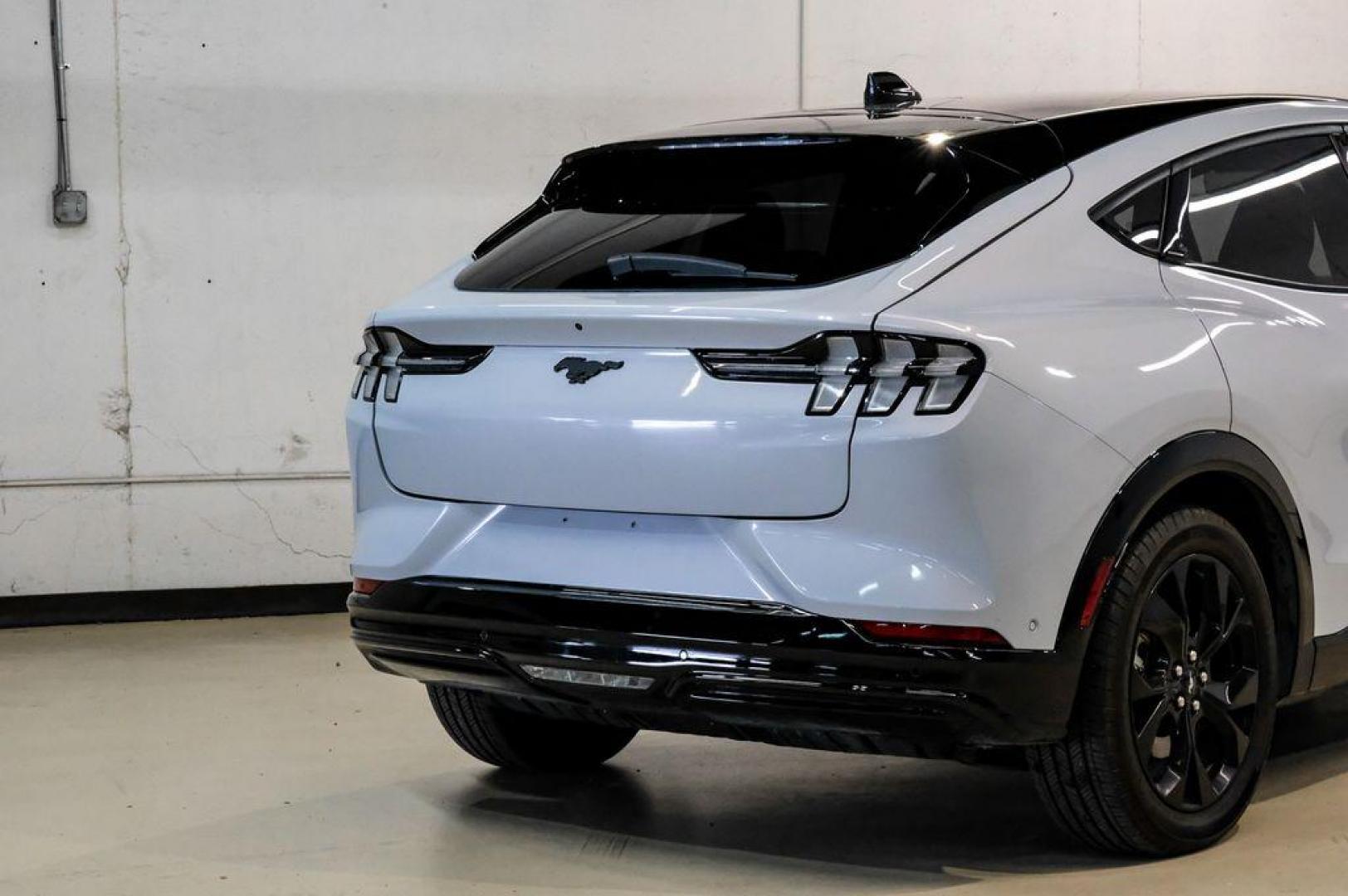 2023 White Metallic /Black Onyx Ford Mustang Mach-E Premium (3FMTK3R71PM) with an Electric Motor engine, Automatic transmission, located at 15300 Midway Rd., Addison, TX, 75001, (972) 702-0011, 32.958321, -96.838074 - Photo#10