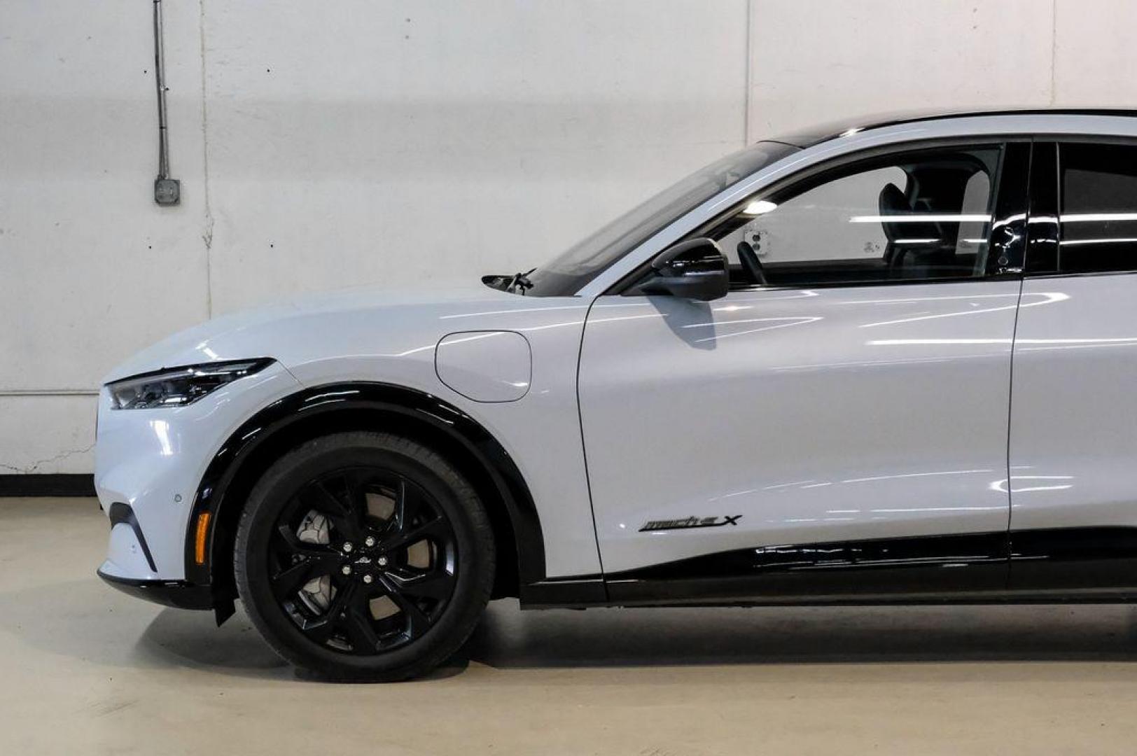 2023 White Metallic /Black Onyx Ford Mustang Mach-E Premium (3FMTK3R71PM) with an Electric Motor engine, Automatic transmission, located at 15300 Midway Rd., Addison, TX, 75001, (972) 702-0011, 32.958321, -96.838074 - Photo#17