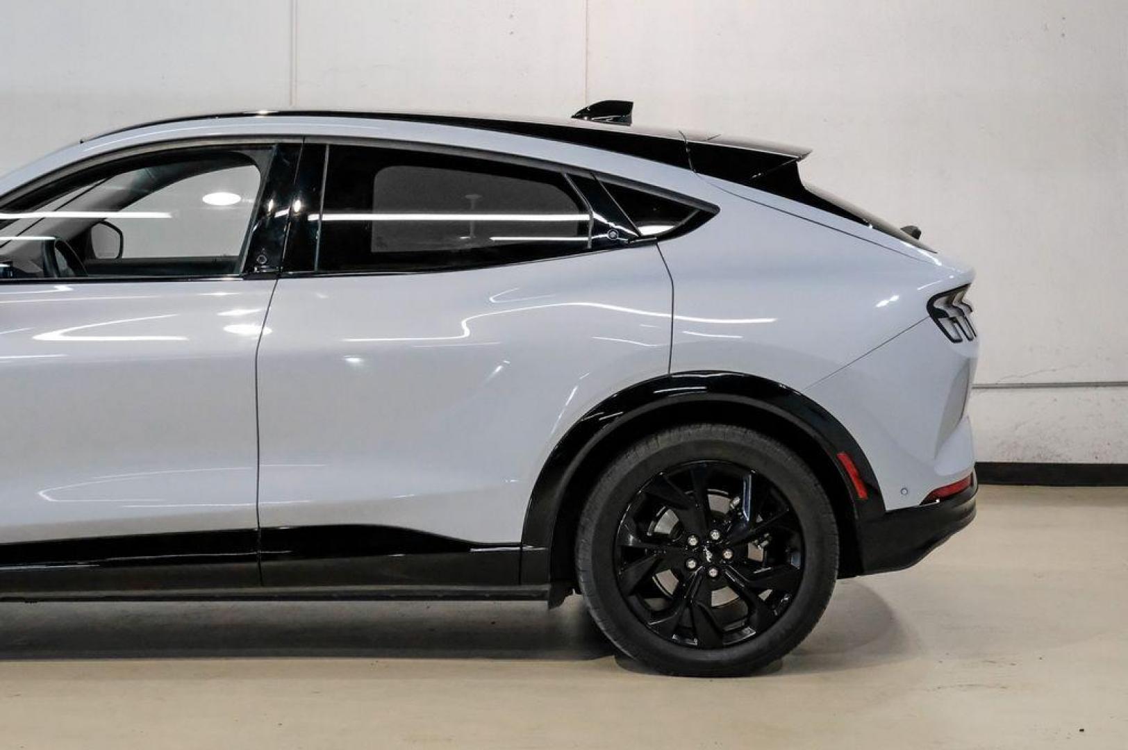 2023 White Metallic /Black Onyx Ford Mustang Mach-E Premium (3FMTK3R71PM) with an Electric Motor engine, Automatic transmission, located at 15300 Midway Rd., Addison, TX, 75001, (972) 702-0011, 32.958321, -96.838074 - Photo#18