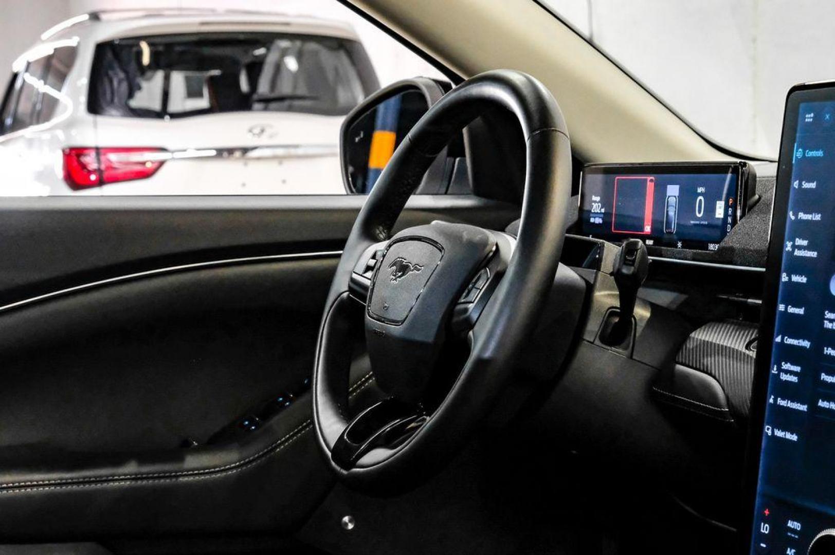 2023 White Metallic /Black Onyx Ford Mustang Mach-E Premium (3FMTK3R71PM) with an Electric Motor engine, Automatic transmission, located at 15300 Midway Rd., Addison, TX, 75001, (972) 702-0011, 32.958321, -96.838074 - Photo#20