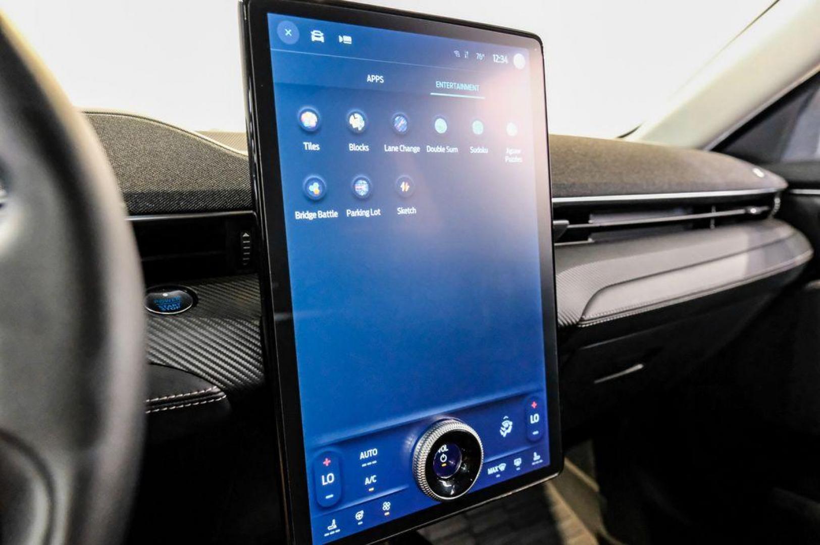 2023 White Metallic /Black Onyx Ford Mustang Mach-E Premium (3FMTK3R71PM) with an Electric Motor engine, Automatic transmission, located at 15300 Midway Rd., Addison, TX, 75001, (972) 702-0011, 32.958321, -96.838074 - Photo#33