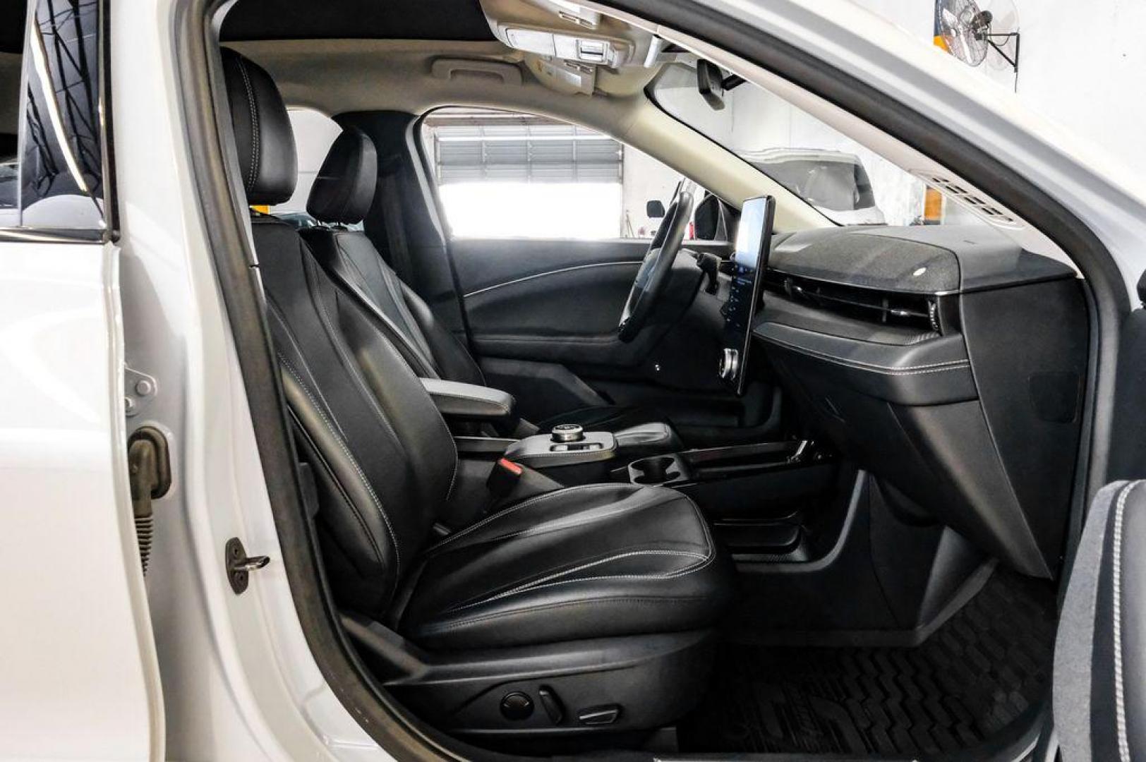 2023 White Metallic /Black Onyx Ford Mustang Mach-E Premium (3FMTK3R71PM) with an Electric Motor engine, Automatic transmission, located at 15300 Midway Rd., Addison, TX, 75001, (972) 702-0011, 32.958321, -96.838074 - Photo#39