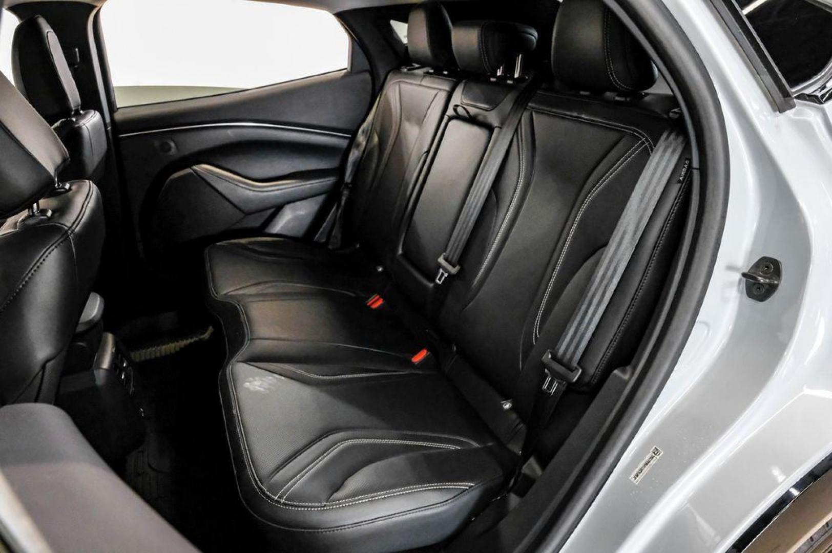 2023 White Metallic /Black Onyx Ford Mustang Mach-E Premium (3FMTK3R71PM) with an Electric Motor engine, Automatic transmission, located at 15300 Midway Rd., Addison, TX, 75001, (972) 702-0011, 32.958321, -96.838074 - Photo#45