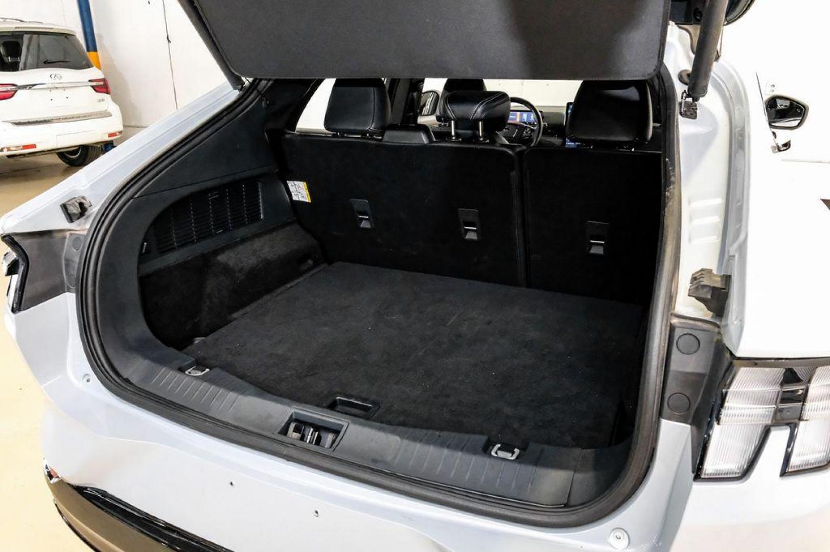 2023 White Metallic /Black Onyx Ford Mustang Mach-E Premium (3FMTK3R71PM) with an Electric Motor engine, Automatic transmission, located at 15300 Midway Rd., Addison, TX, 75001, (972) 702-0011, 32.958321, -96.838074 - Photo#57