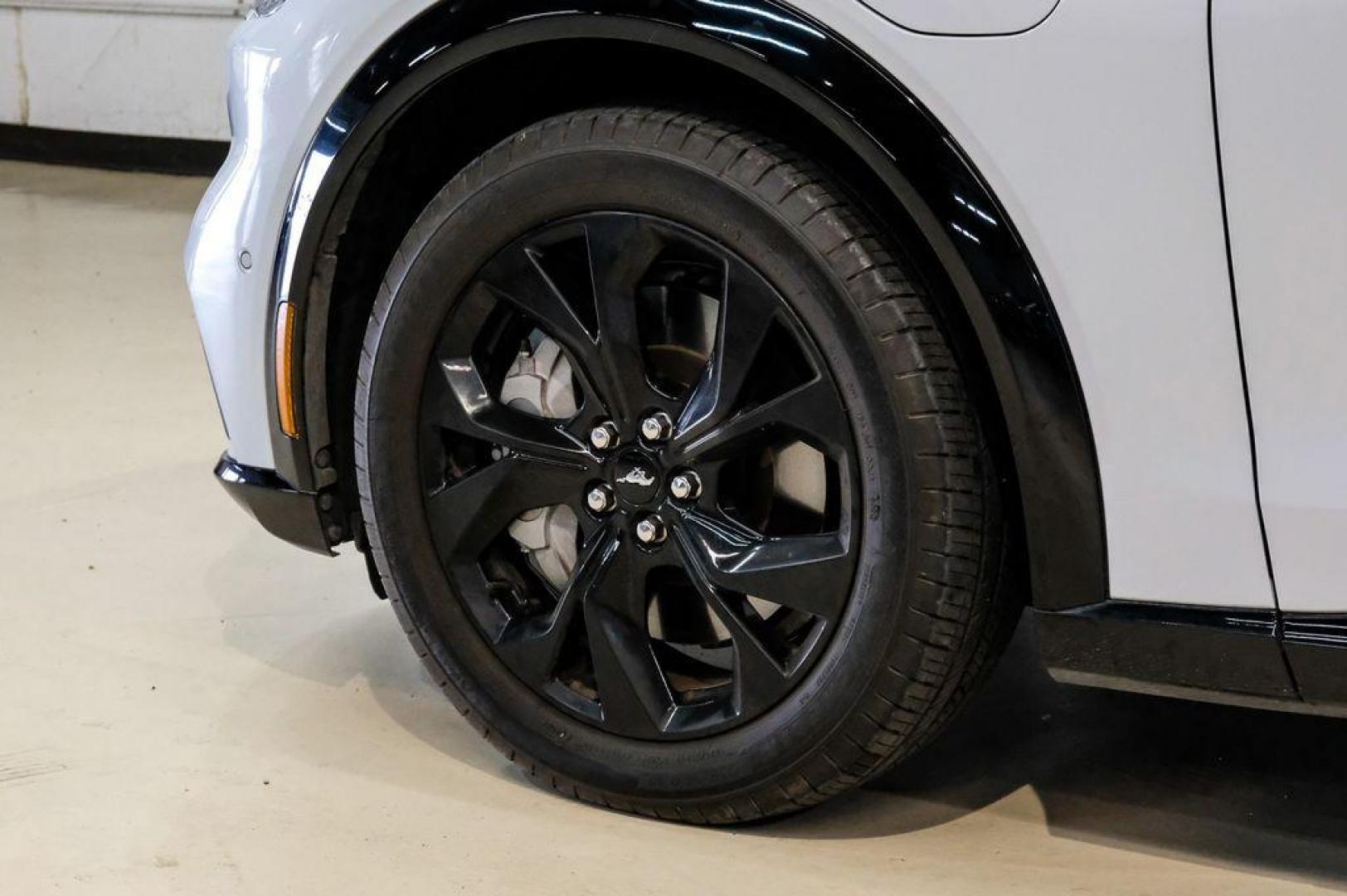 2023 White Metallic /Black Onyx Ford Mustang Mach-E Premium (3FMTK3R71PM) with an Electric Motor engine, Automatic transmission, located at 15300 Midway Rd., Addison, TX, 75001, (972) 702-0011, 32.958321, -96.838074 - Photo#61