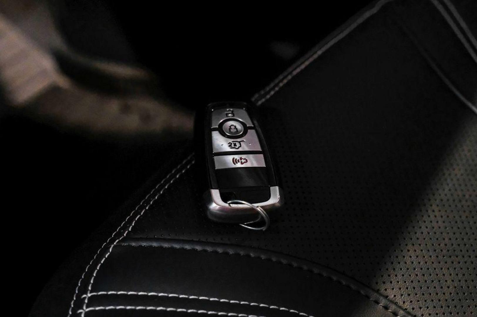 2023 White Metallic /Black Onyx Ford Mustang Mach-E Premium (3FMTK3R71PM) with an Electric Motor engine, Automatic transmission, located at 15300 Midway Rd., Addison, TX, 75001, (972) 702-0011, 32.958321, -96.838074 - Photo#63