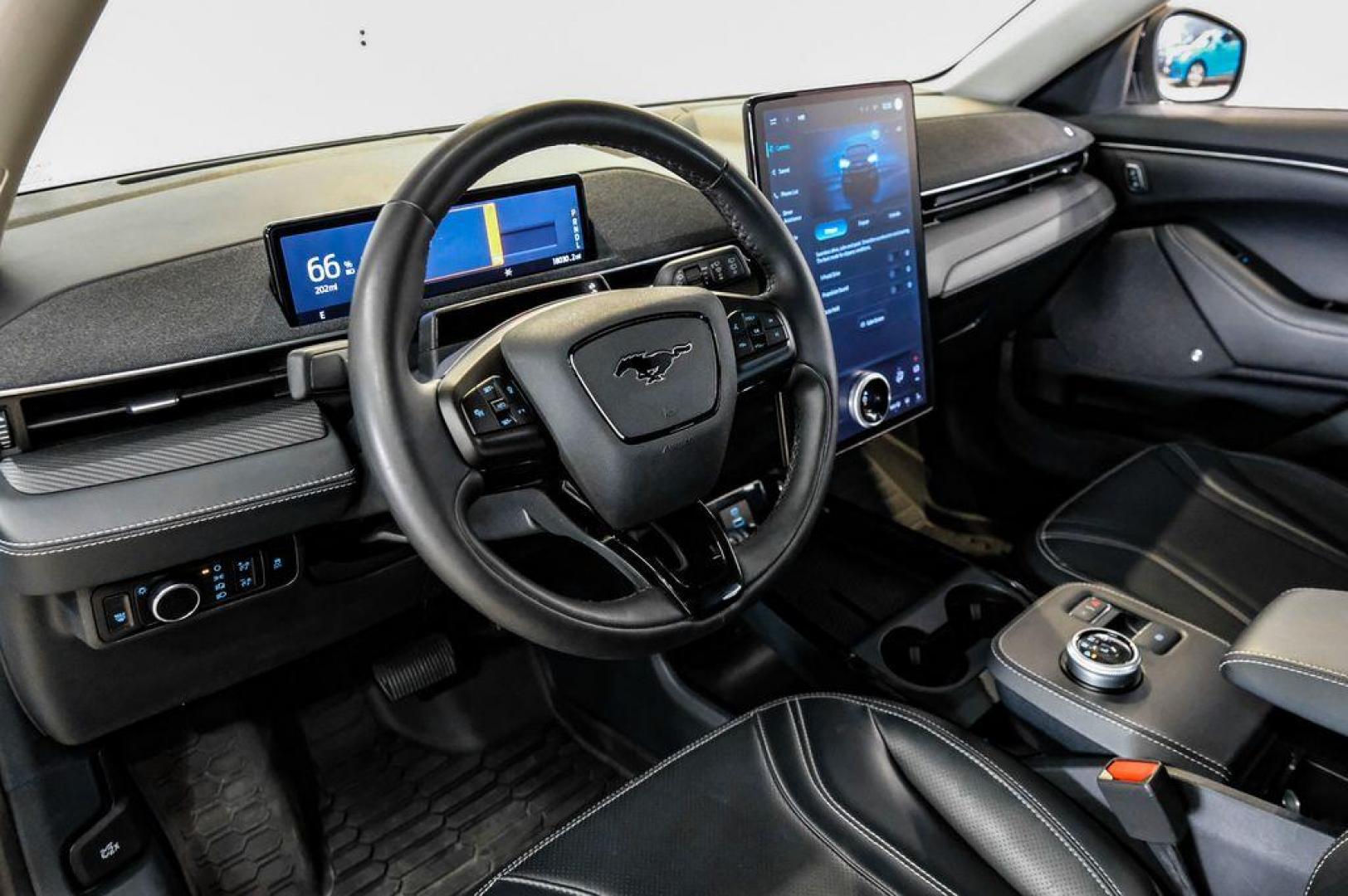 2023 White Metallic /Black Onyx Ford Mustang Mach-E Premium (3FMTK3R71PM) with an Electric Motor engine, Automatic transmission, located at 15300 Midway Rd., Addison, TX, 75001, (972) 702-0011, 32.958321, -96.838074 - Photo#2