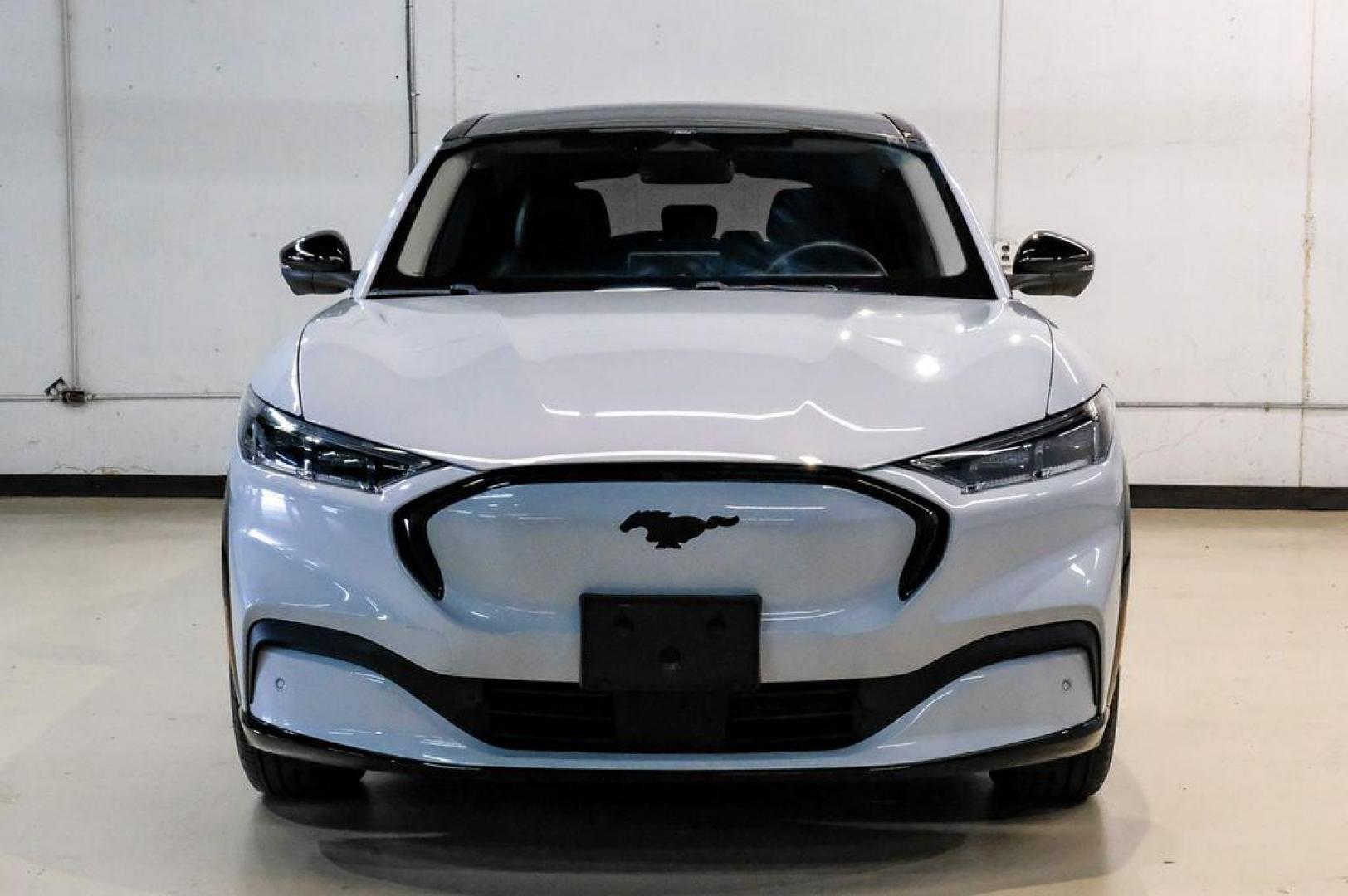 2023 White Metallic /Black Onyx Ford Mustang Mach-E Premium (3FMTK3R71PM) with an Electric Motor engine, Automatic transmission, located at 15300 Midway Rd., Addison, TX, 75001, (972) 702-0011, 32.958321, -96.838074 - Photo#5