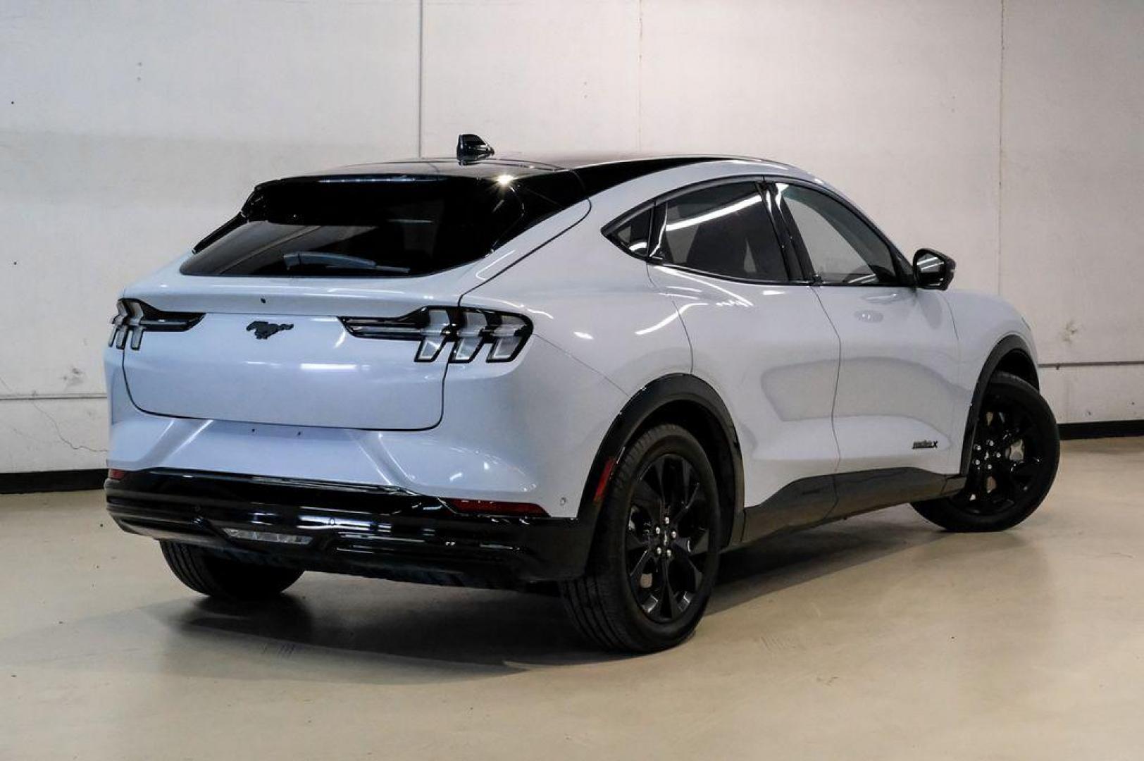 2023 White Metallic /Black Onyx Ford Mustang Mach-E Premium (3FMTK3R71PM) with an Electric Motor engine, Automatic transmission, located at 15300 Midway Rd., Addison, TX, 75001, (972) 702-0011, 32.958321, -96.838074 - Photo#8