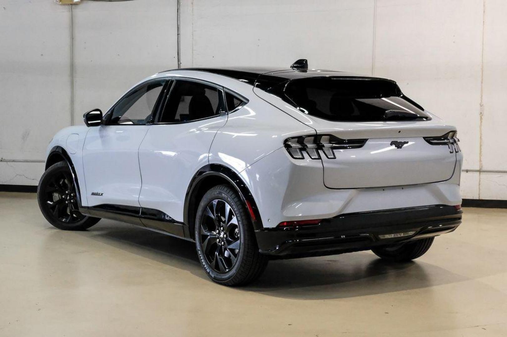 2023 White Metallic /Black Onyx Ford Mustang Mach-E Premium (3FMTK3R71PM) with an Electric Motor engine, Automatic transmission, located at 15300 Midway Rd., Addison, TX, 75001, (972) 702-0011, 32.958321, -96.838074 - Photo#12