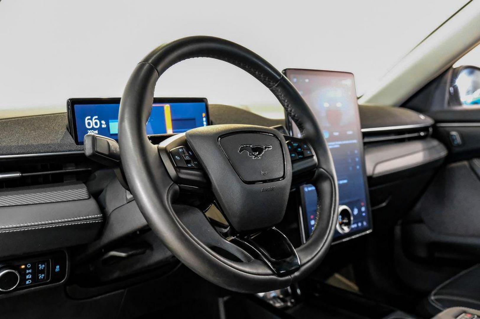 2023 White Metallic /Black Onyx Ford Mustang Mach-E Premium (3FMTK3R71PM) with an Electric Motor engine, Automatic transmission, located at 15300 Midway Rd., Addison, TX, 75001, (972) 702-0011, 32.958321, -96.838074 - Photo#21