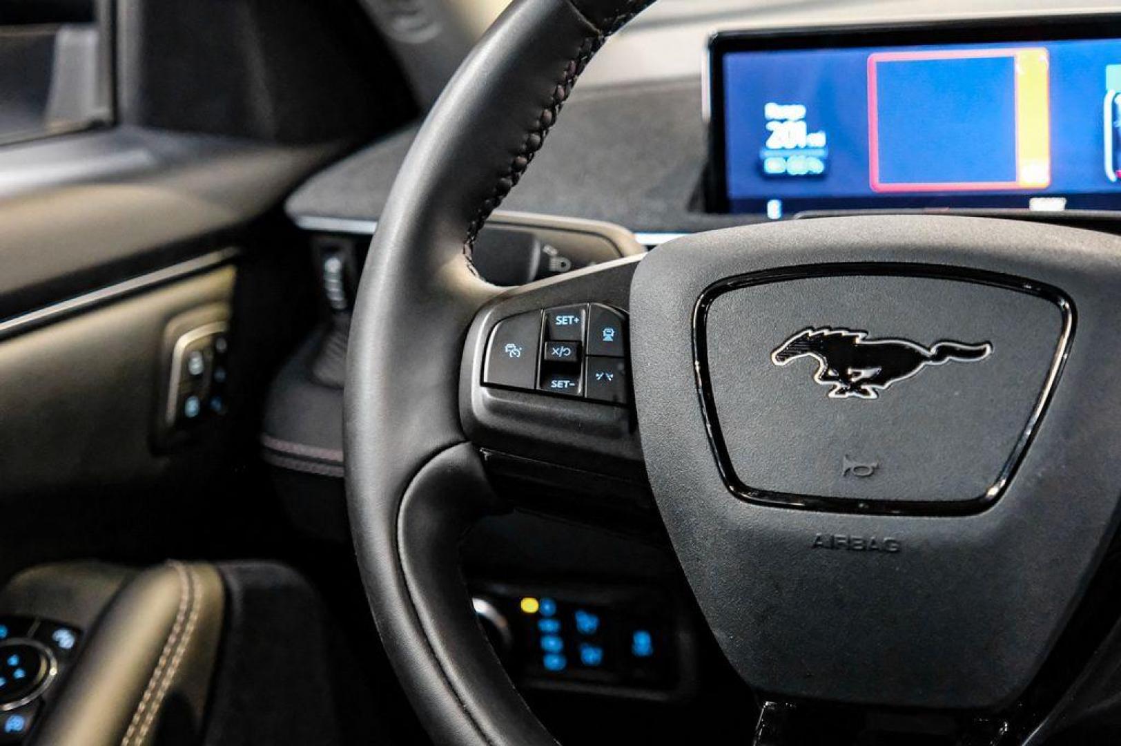 2023 White Metallic /Black Onyx Ford Mustang Mach-E Premium (3FMTK3R71PM) with an Electric Motor engine, Automatic transmission, located at 15300 Midway Rd., Addison, TX, 75001, (972) 702-0011, 32.958321, -96.838074 - Photo#23