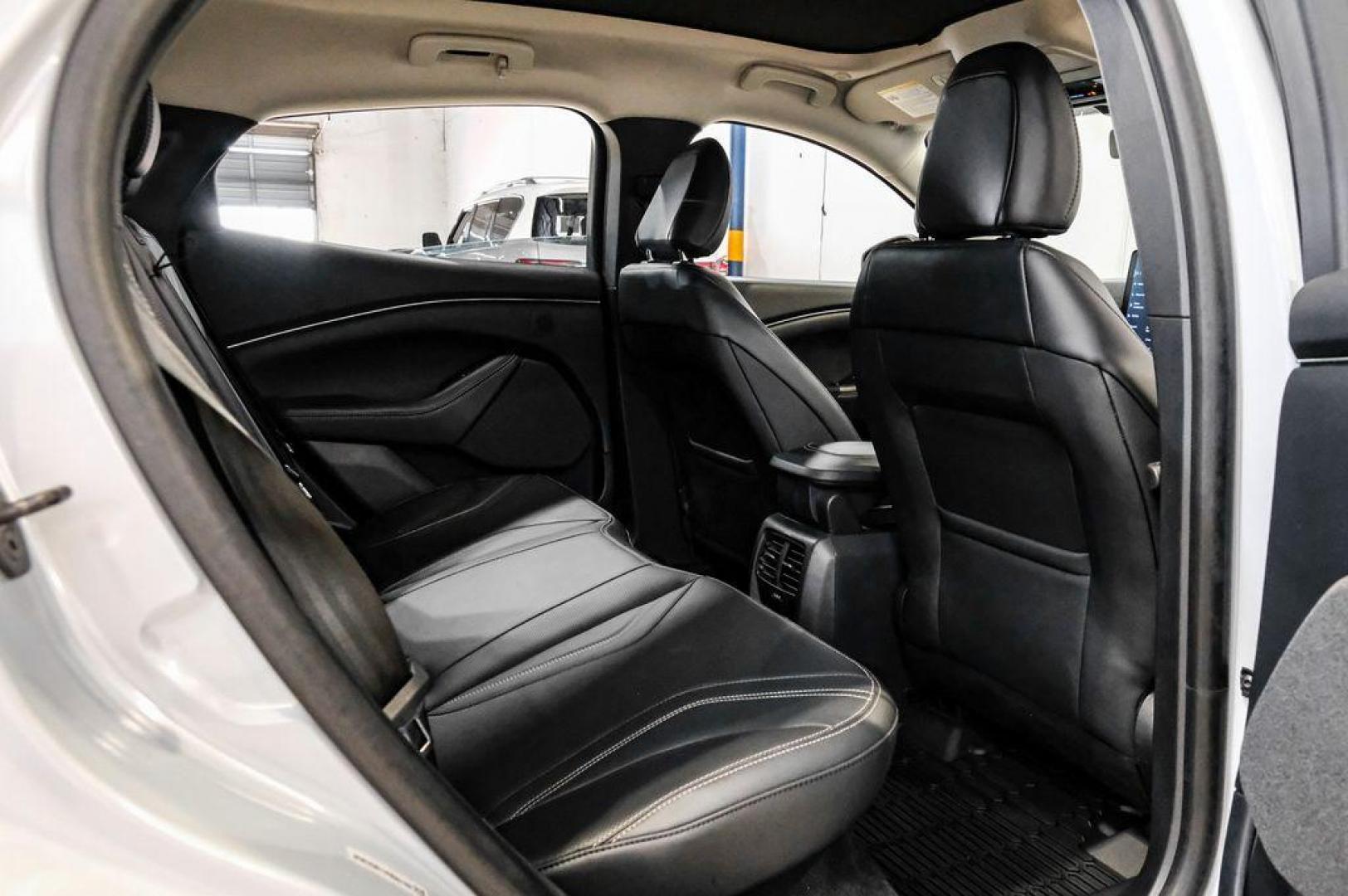 2023 White Metallic /Black Onyx Ford Mustang Mach-E Premium (3FMTK3R71PM) with an Electric Motor engine, Automatic transmission, located at 15300 Midway Rd., Addison, TX, 75001, (972) 702-0011, 32.958321, -96.838074 - Photo#41