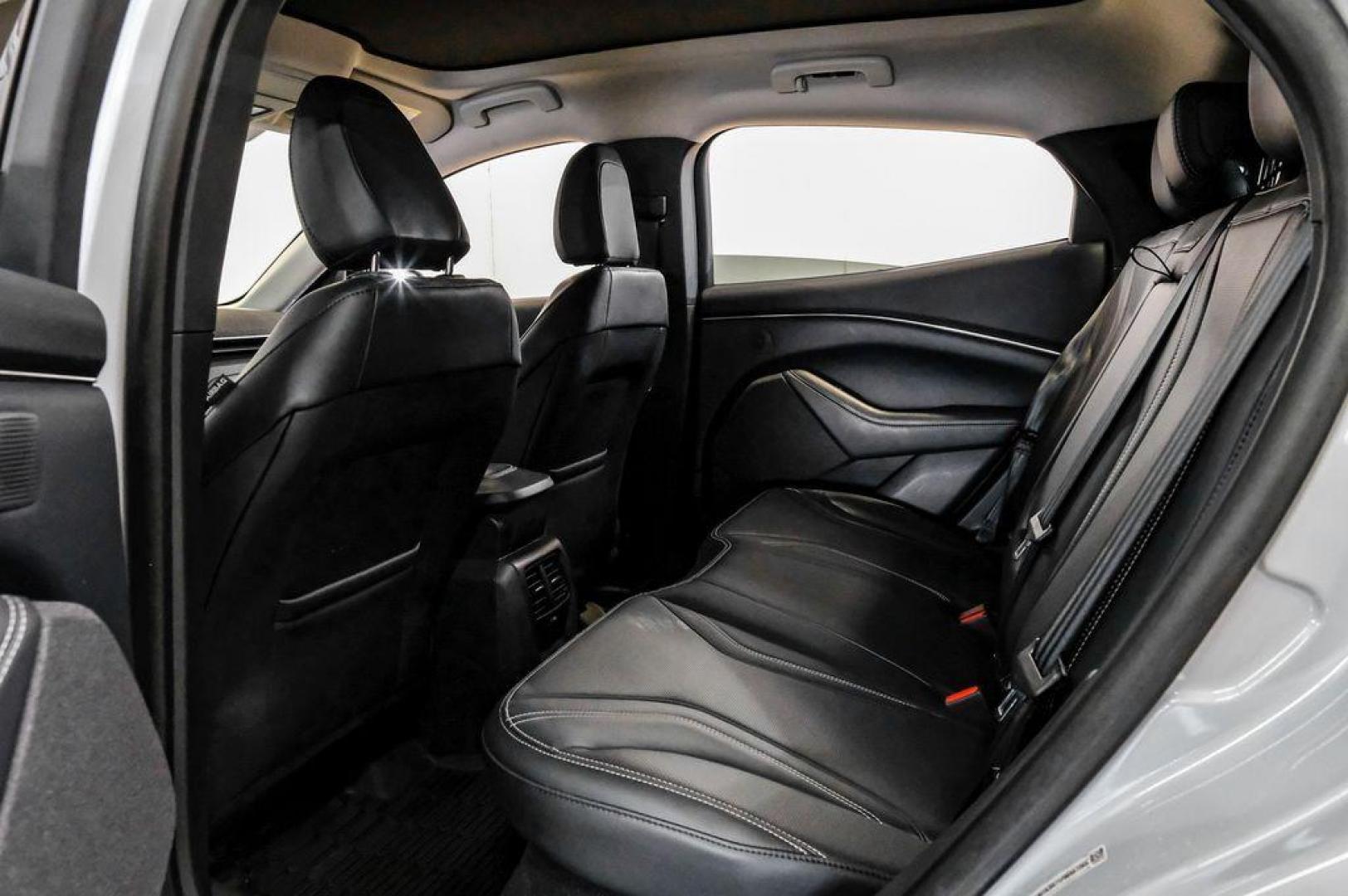 2023 White Metallic /Black Onyx Ford Mustang Mach-E Premium (3FMTK3R71PM) with an Electric Motor engine, Automatic transmission, located at 15300 Midway Rd., Addison, TX, 75001, (972) 702-0011, 32.958321, -96.838074 - Photo#43