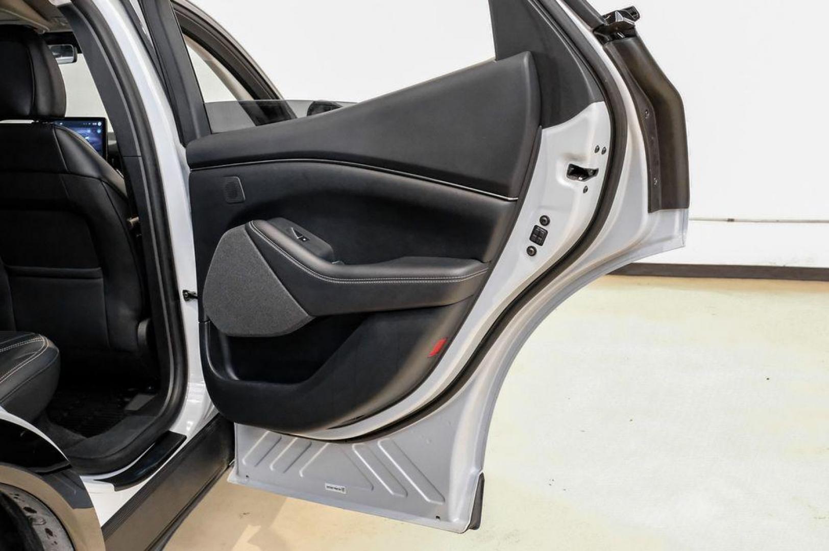 2023 White Metallic /Black Onyx Ford Mustang Mach-E Premium (3FMTK3R71PM) with an Electric Motor engine, Automatic transmission, located at 15300 Midway Rd., Addison, TX, 75001, (972) 702-0011, 32.958321, -96.838074 - Photo#51