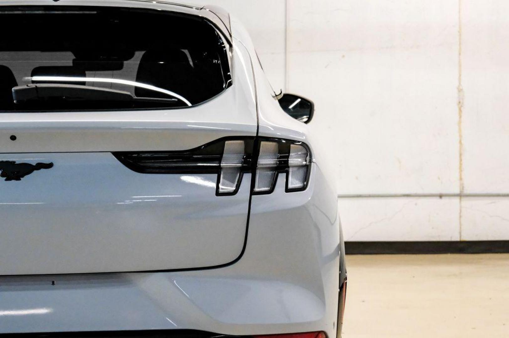 2023 White Metallic /Black Onyx Ford Mustang Mach-E Premium (3FMTK3R71PM) with an Electric Motor engine, Automatic transmission, located at 15300 Midway Rd., Addison, TX, 75001, (972) 702-0011, 32.958321, -96.838074 - Photo#53