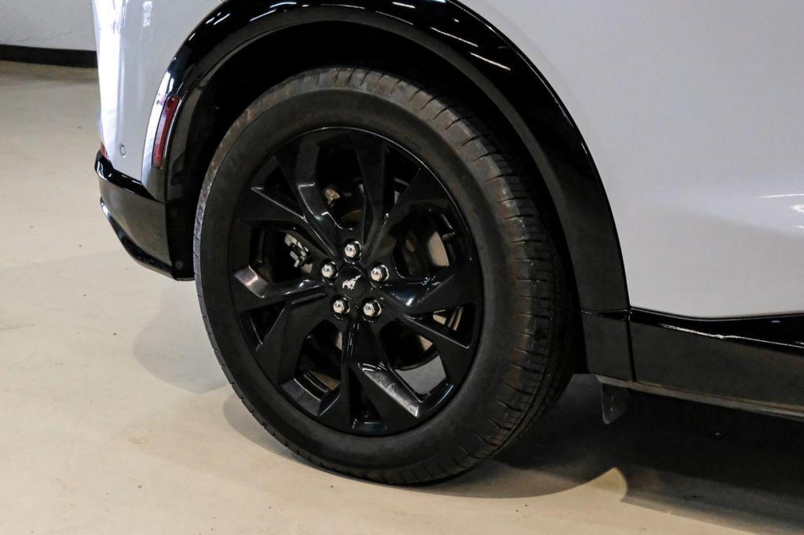 2023 White Metallic /Black Onyx Ford Mustang Mach-E Premium (3FMTK3R71PM) with an Electric Motor engine, Automatic transmission, located at 15300 Midway Rd., Addison, TX, 75001, (972) 702-0011, 32.958321, -96.838074 - Photo#58