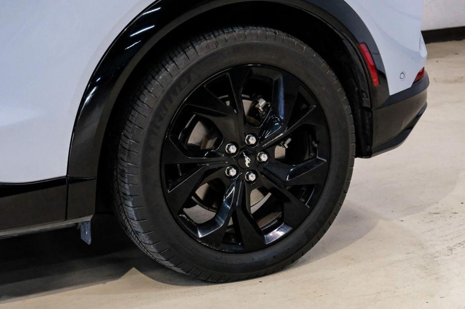 2023 White Metallic /Black Onyx Ford Mustang Mach-E Premium (3FMTK3R71PM) with an Electric Motor engine, Automatic transmission, located at 15300 Midway Rd., Addison, TX, 75001, (972) 702-0011, 32.958321, -96.838074 - Photo#61