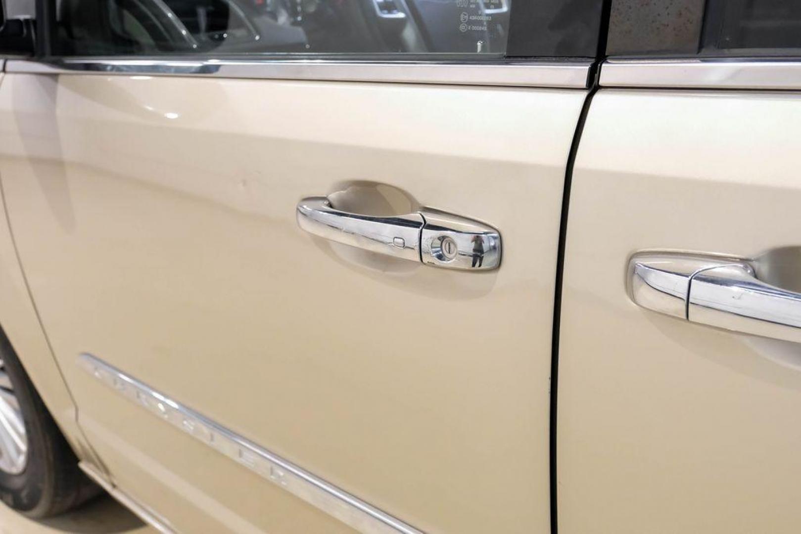 2016 Sandstone /Beige Chrysler Town and Country Touring-L (2C4RC1CG5GR) with an 3.6L V6 Flex Fuel 24V VVT engine, Automatic transmission, located at 15300 Midway Rd., Addison, TX, 75001, (972) 702-0011, 32.958321, -96.838074 - Photo#42