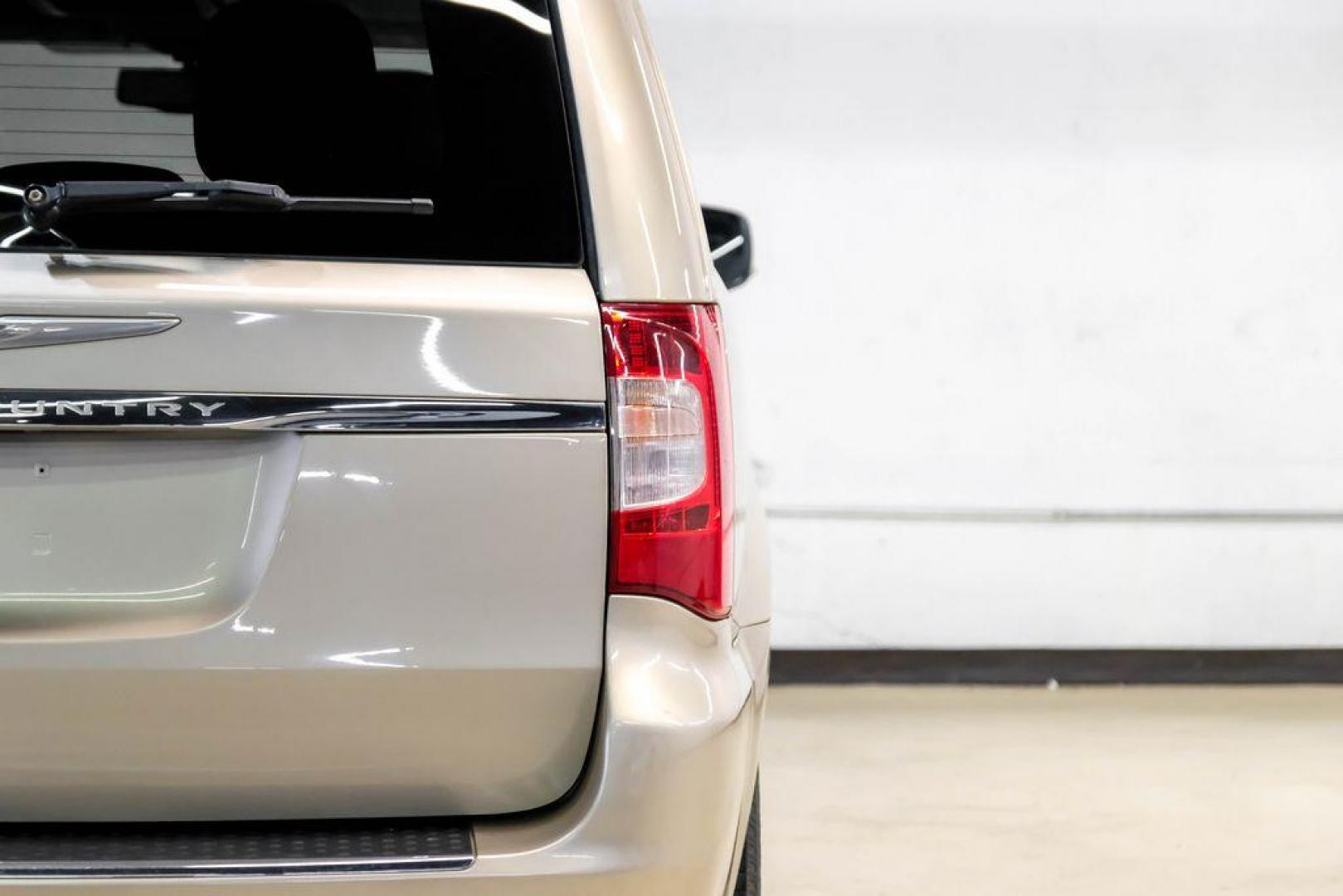 2016 Sandstone /Beige Chrysler Town and Country Touring-L (2C4RC1CG5GR) with an 3.6L V6 Flex Fuel 24V VVT engine, Automatic transmission, located at 15300 Midway Rd., Addison, TX, 75001, (972) 702-0011, 32.958321, -96.838074 - Photo#50