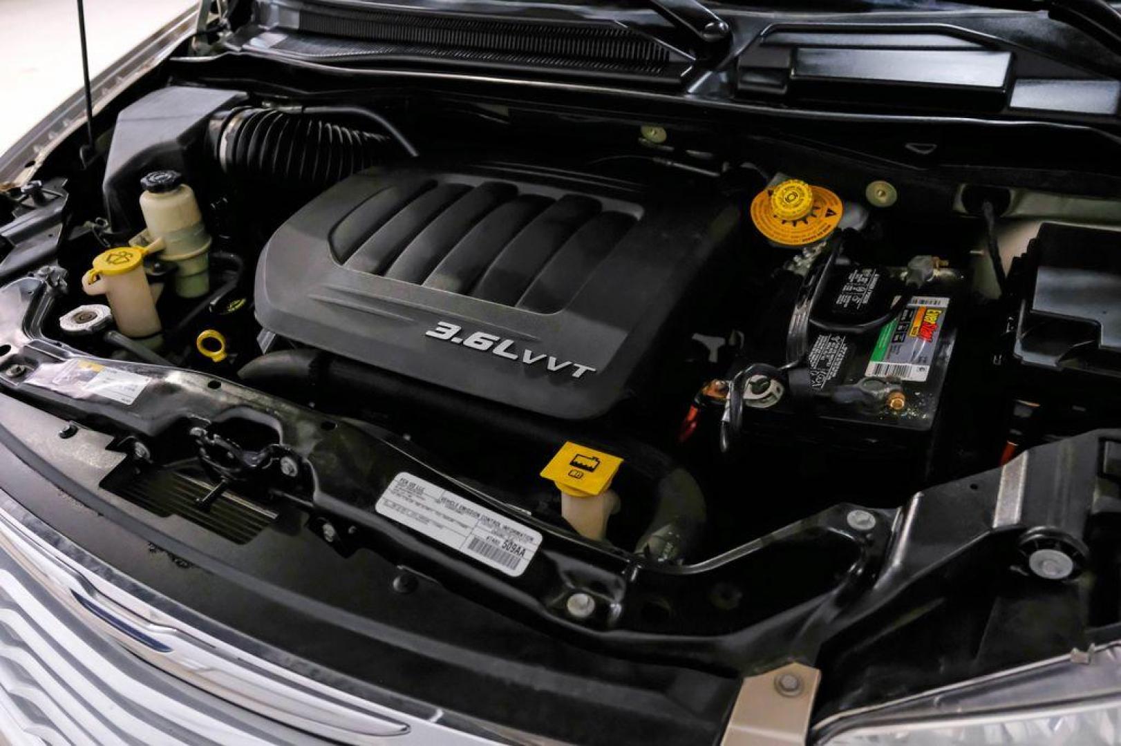 2016 Sandstone /Beige Chrysler Town and Country Touring-L (2C4RC1CG5GR) with an 3.6L V6 Flex Fuel 24V VVT engine, Automatic transmission, located at 15300 Midway Rd., Addison, TX, 75001, (972) 702-0011, 32.958321, -96.838074 - Photo#51